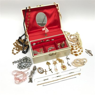 Lot 2428 - A musical jewel box containing costume...