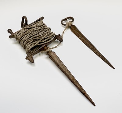 Lot 96 - A cast iron groundsman's swivel line marker....