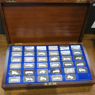 Lot 2196 - A set of 35 silver ingot medallions by John...