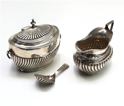 Lot 2004 - A Victorian half spiral fluted silver tea...