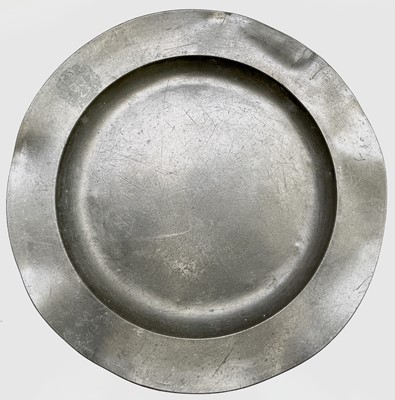 Lot 60 - A pewter charger, 19th century, of circular...