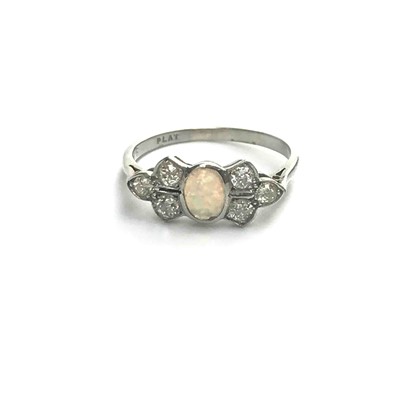 Lot 2752 - A 1930s platinum diamond and opal ring set to...