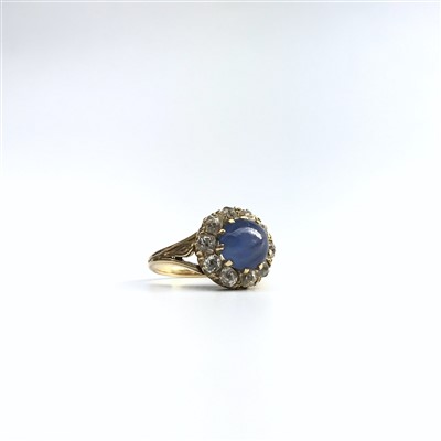 Lot 2753 - An earls 20th century gold ring with a star...