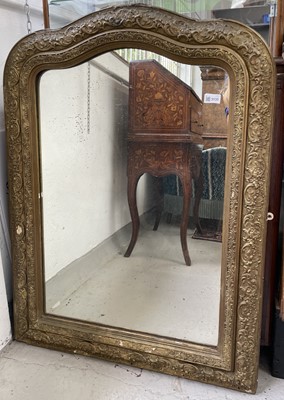 Lot 3135 - A late Victorian gilt gesso overmantel mirror...