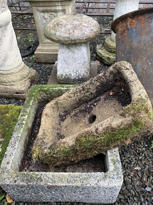 Lot 655 - A miniature composite stone staddle stone on...