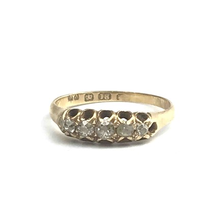 Lot 2770 - An 18ct gold ring set 5 diamonds.