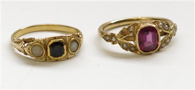 Lot 2771 - Two Victorian gold pearl and red stone set rings