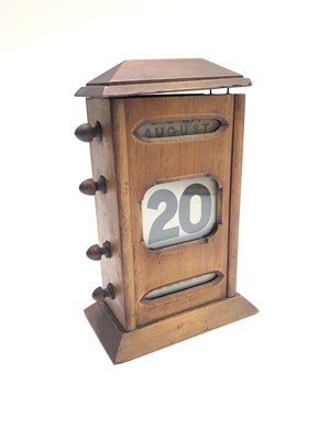 Lot 24 - An early 20th century oak perpetual desk...