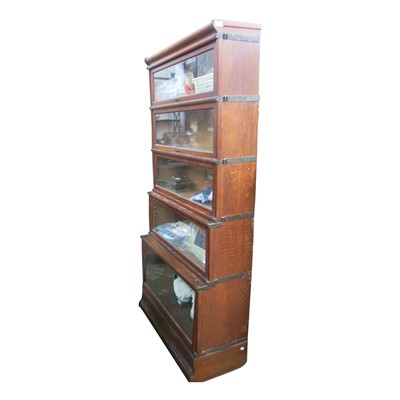 Lot 3339 - An oak Globe Wernicke bookcase, the five...