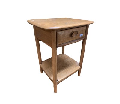 Lot 3064 - An Ercol light elm small side or bedside table,...