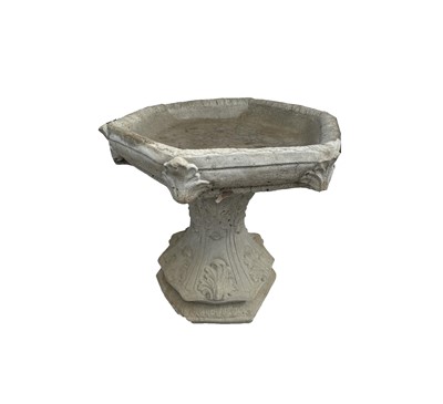 Lot 616 - A reconstituted stone bird bath, with...