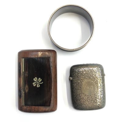 Lot 2448 - A silver napkin ring, a late Victorian silver...