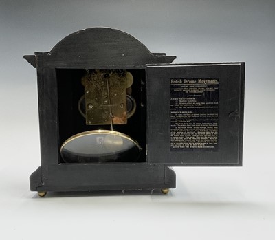 Lot 2926 - An oak cased mantel clock, with twist side...