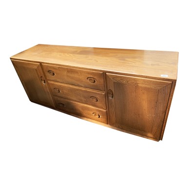Lot 3069 - An Ercol light elm sideboard, probably 1970s,...
