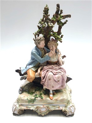 Lot 1032 - A Continental porcelain group of a courting...