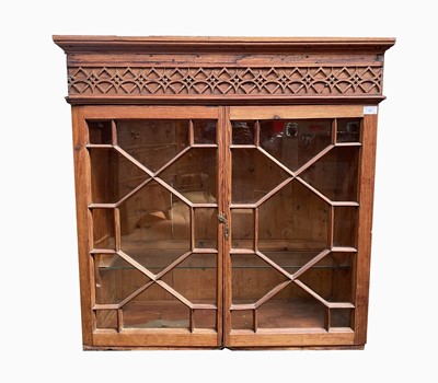 Lot 41 - A pitch pine hanging display cupboard, late...