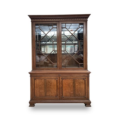 Lot 3026 - An oak glazed bookcase, early 20th century,...