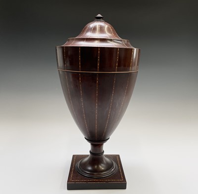 Lot 12 - A George III mahogany cutlery urn, with...