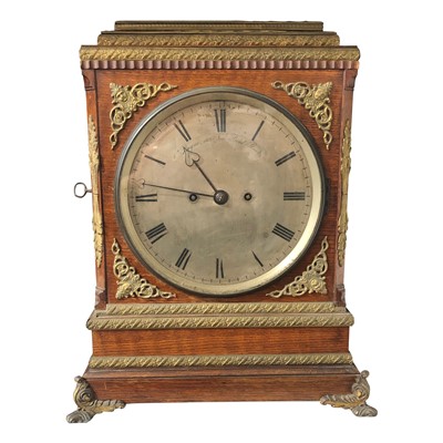 Lot 3043 - A Regency style oak bracket clock,19th century,...
