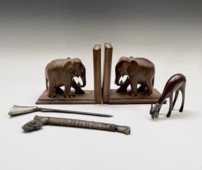 Lot 27 - A small Malaysian kris with white metal grip...