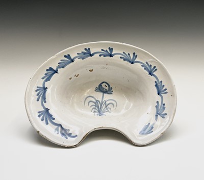 Lot 93 - A tin glazed barber's bowl, 18th century,...