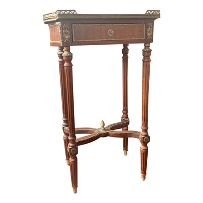 Lot 3312 - A pair of French inlaid side tables, each with...