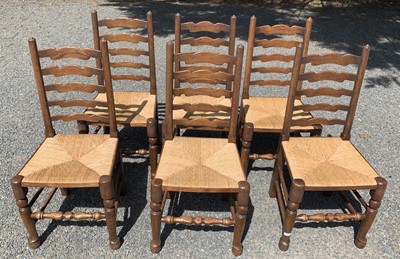 Lot 135 - A set of six ladderback rush seated dining...
