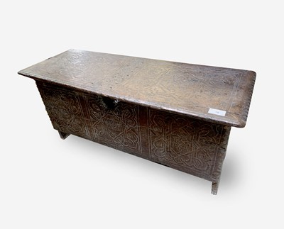 Lot 78 - A carved oak sword chest, 17th century, the...