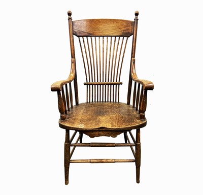 Lot 84 - A near pair of American oak armchairs, circa...