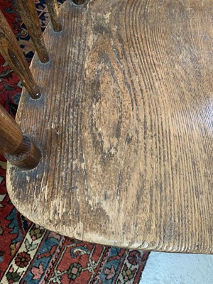 Lot 84 - A near pair of American oak armchairs, circa...
