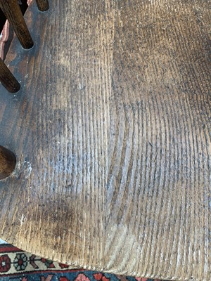 Lot 84 - A near pair of American oak armchairs, circa...
