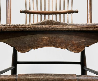Lot 84 - A near pair of American oak armchairs, circa...