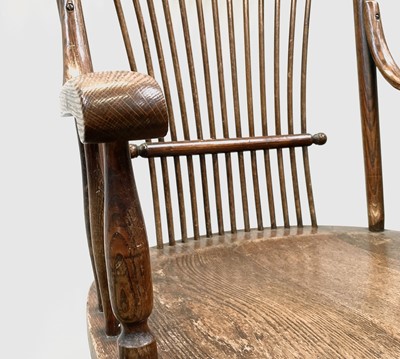 Lot 84 - A near pair of American oak armchairs, circa...