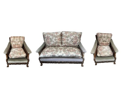 Lot 3124 - A three piece walnut Bergere suite, with...