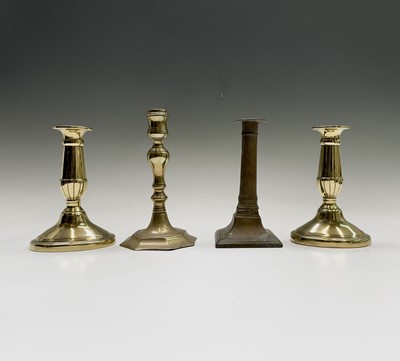 Lot 110 - An 18th century brass candlestick, with...