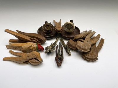 Lot 176 - A Continental treen nutcracker, in the form of...