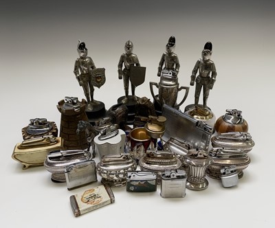 Lot 177 - A large collection of table lighters,...