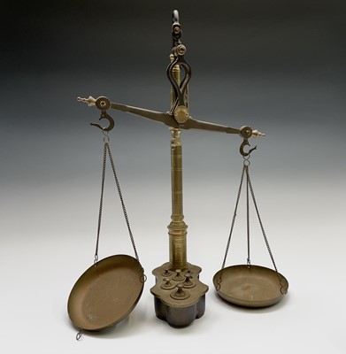 Lot 179 - A set of continental brass scales, with turned...
