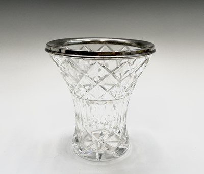 Lot 916 - A cut glass bowl with hallmarked silver rim,...