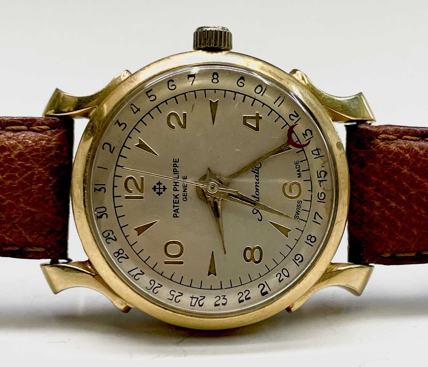 Lot 14 - A gentleman's automatic watch with spurious...