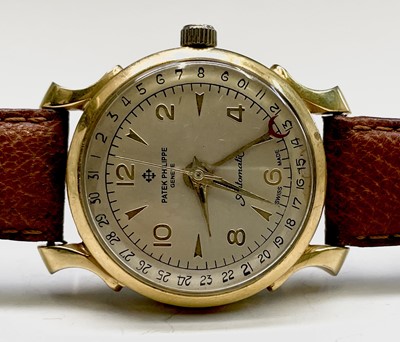 Lot 15 - A gentleman's automatic watch with spurious...