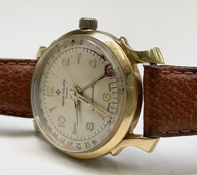 Lot 14 - A gentleman's automatic watch with spurious...