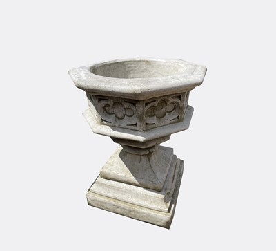 Lot 600 - A reconstituted stone Gothic font style...