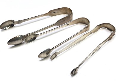 Lot 2027 - A pair of Georgian bright cut silver sugar...