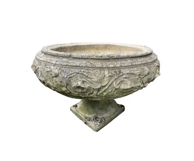 Lot 649 - A reconstituted stone planter of circular font...
