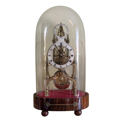 Lot 3001 - A steeple single fusee brass skeleton clock...