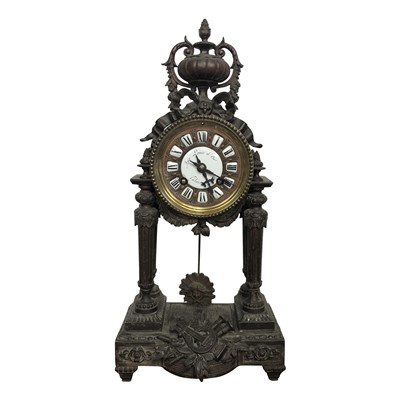 Lot 3021 - A French metal mantel clock, late 19th century,...