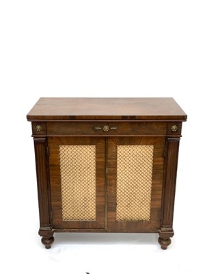 Lot 3052 - A Regency rosewood side cabinet, the doors...