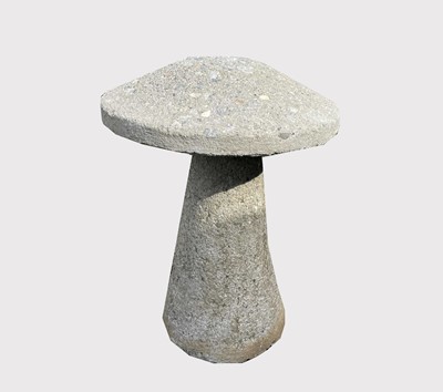 Lot 663 - A composition stone staddle stone. Height 62cm.