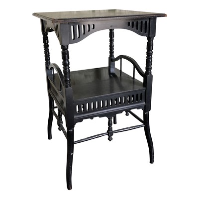 Lot 3375 - A high Victorian ebonised two tier occasional...